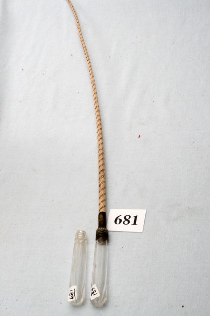 The fiber whip extends about 3 feet from the glass handle of this rare candy container. Image courtesy Old Barn Auction.